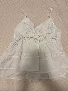 white flowy babydoll top